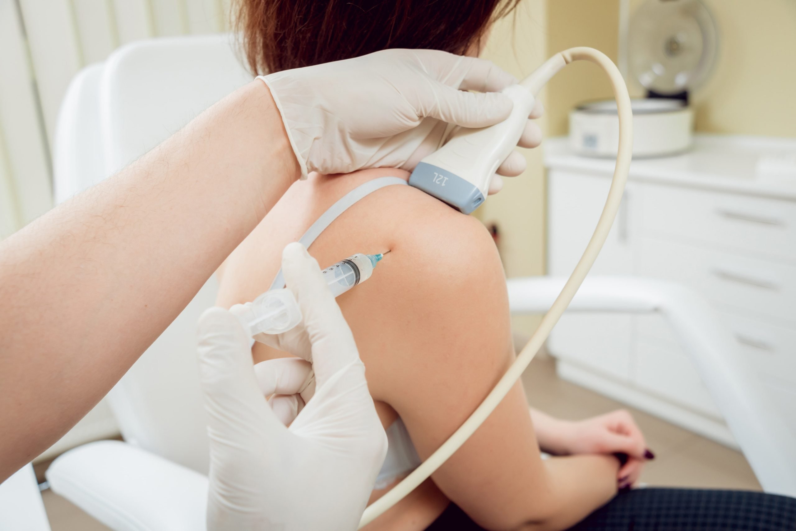  Lady having an Ultrasound-Guided Injection