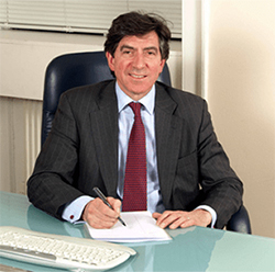 Mr. Gerald Brookes, smiling